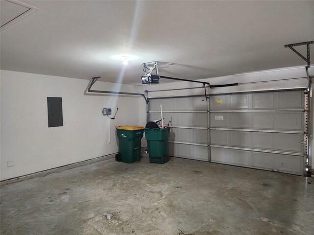 20390 Tembec Dr, New Caney, TX 77357 - garage featuring electric panel and a garage door opener