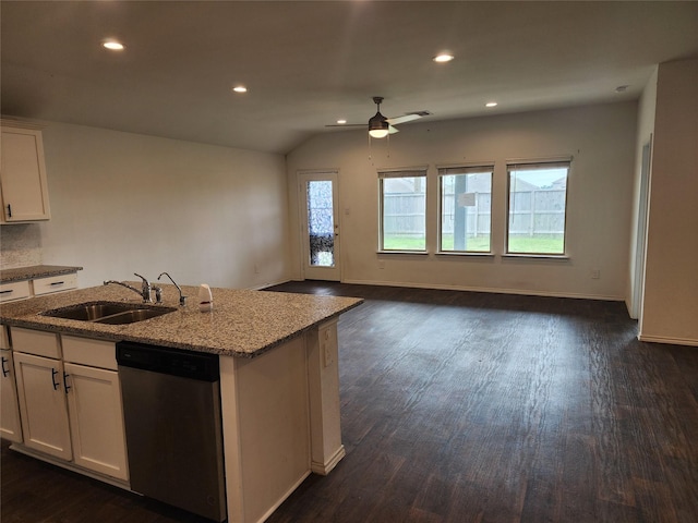 20390 Tembec Dr, New Caney, TX 77357 - kitchen featuring dishwasher, a ceiling fan, dark wood-style flooring, light stone countertops, and white cabinetry