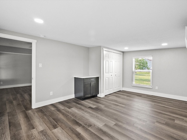 246 18th St, Dickinson, TX 77539 - empty room featuring dark wood-style floors and recessed lighting