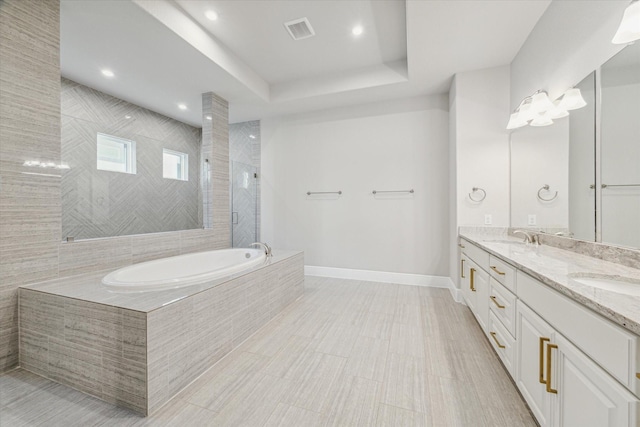 3954 Kelley Pond Dr, Spring, TX 77386 - bathroom with a bath, double vanity, tiled shower, recessed lighting, and a raised ceiling
