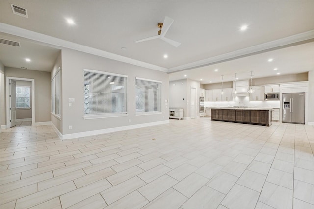 3954 Kelley Pond Dr, Spring, TX 77386 - unfurnished living room with a ceiling fan, crown molding, and recessed lighting