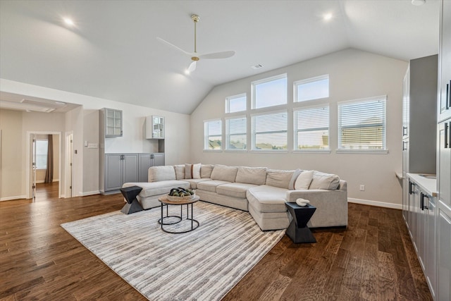 3954 Kelley Pond Dr, Spring, TX 77386 - living area featuring lofted ceiling, ceiling fan, and dark wood-style flooring