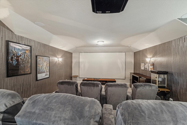 3954 Kelley Pond Dr, Spring, TX 77386 - cinema room featuring vaulted ceiling and wallpapered walls