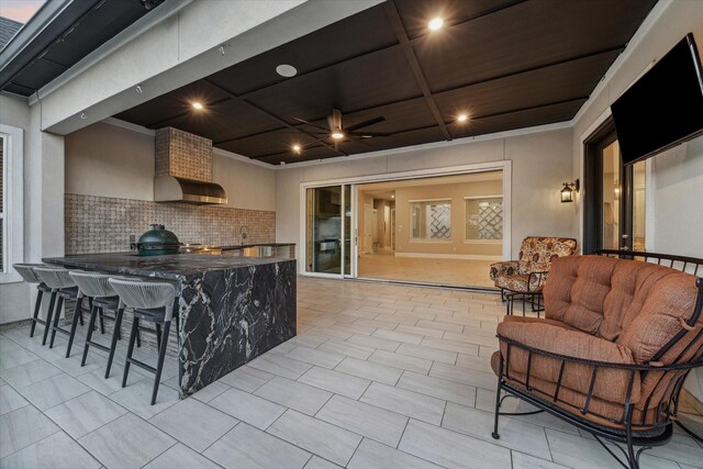 3954 Kelley Pond Dr, Spring, TX 77386 - kitchen featuring tasteful backsplash, wall chimney range hood, dark countertops, ceiling fan, and recessed lighting