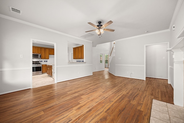 2722 Round Hill Ct, Katy, TX 77494 - unfurnished living room featuring ceiling fan, light wood-style floors, and ornamental molding