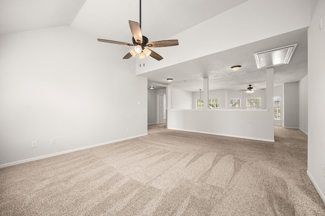 2722 Round Hill Ct, Katy, TX 77494 - unfurnished living room with ceiling fan, attic access, carpet floors, and lofted ceiling