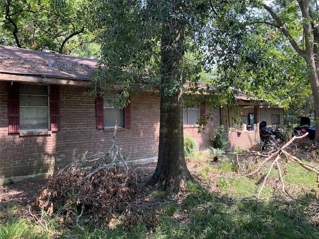 13222 Ann Louise Rd, Houston, TX 77086 - view of home's exterior with brick siding