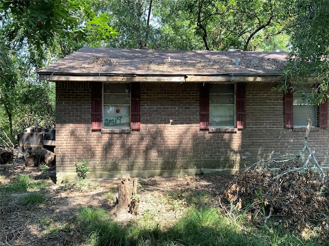 13222 Ann Louise Rd, Houston, TX 77086 - view of side of property featuring brick siding
