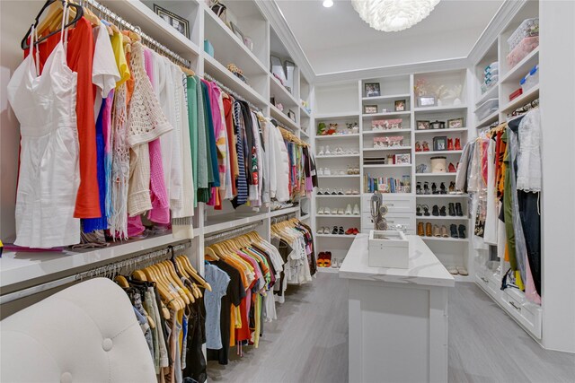 4821 1st St, Houston, TX 77504 - walk in closet featuring wood finished floors