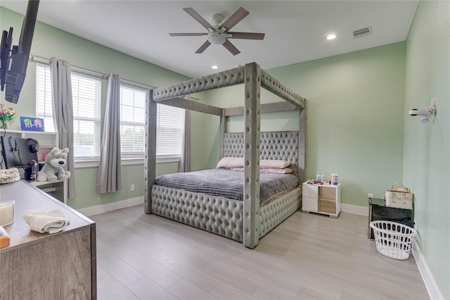 4821 1st St, Houston, TX 77504 - bedroom with light wood-style flooring, recessed lighting, and a ceiling fan