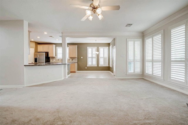 13212 Lismore Pt, Cypress, TX 77429 - unfurnished living room with light colored carpet, ceiling fan, crown molding, and recessed lighting