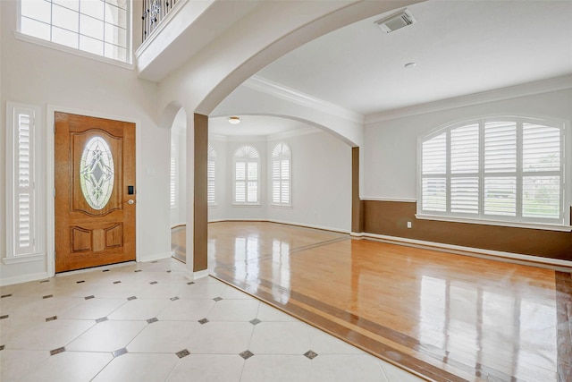 13212 Lismore Pt, Cypress, TX 77429 - foyer entrance with ornamental molding and arched walkways