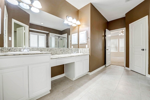 13212 Lismore Pt, Cypress, TX 77429 - bathroom with double vanity, a stall shower, and tile patterned floors