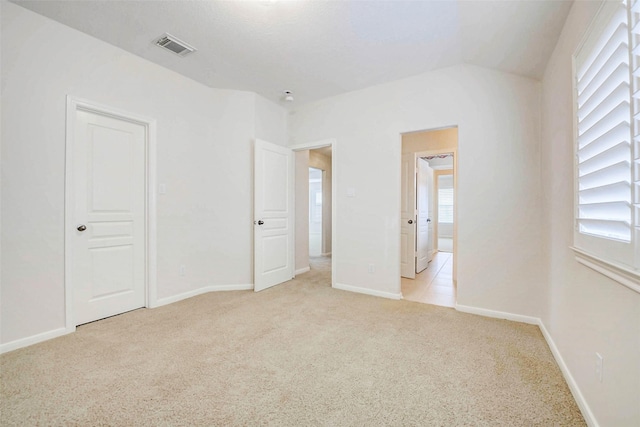 13212 Lismore Pt, Cypress, TX 77429 - unfurnished bedroom with light colored carpet and multiple windows