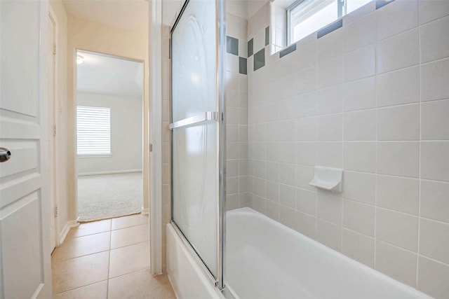 13212 Lismore Pt, Cypress, TX 77429 - bathroom with healthy amount of natural light, enclosed tub / shower combo, and tile patterned floors