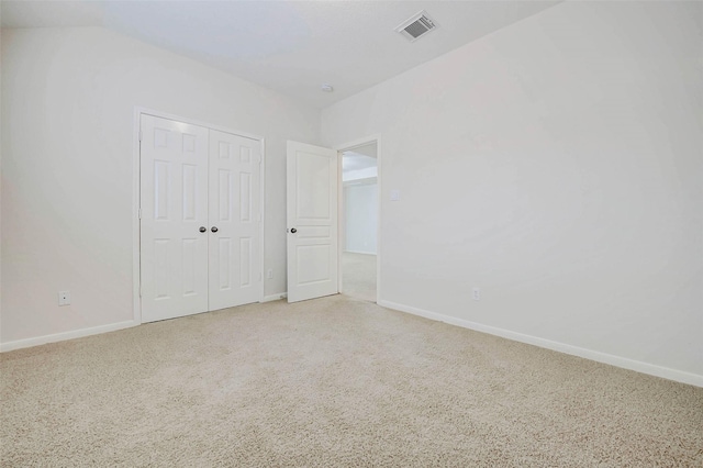 13212 Lismore Pt, Cypress, TX 77429 - unfurnished bedroom with light carpet and a closet