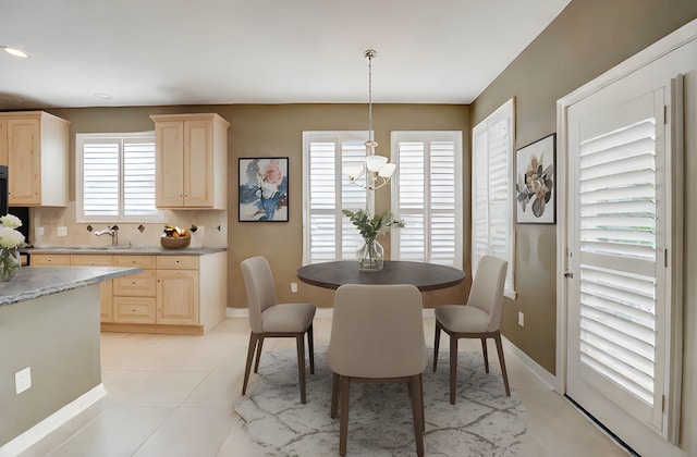 13212 Lismore Pt, Cypress, TX 77429 - dining room with a chandelier and light tile patterned floors