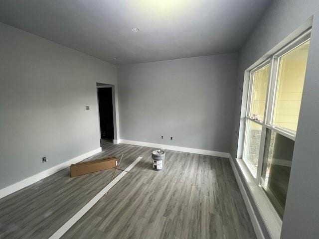 6985 Ellen Ln, Beaumont, TX 77708 - unfurnished room featuring baseboards and wood finished floors