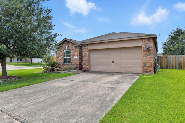 737 Grassy Knoll Ln, La Marque, TX 77568 - view of front of home with brick siding, driveway, and a garage