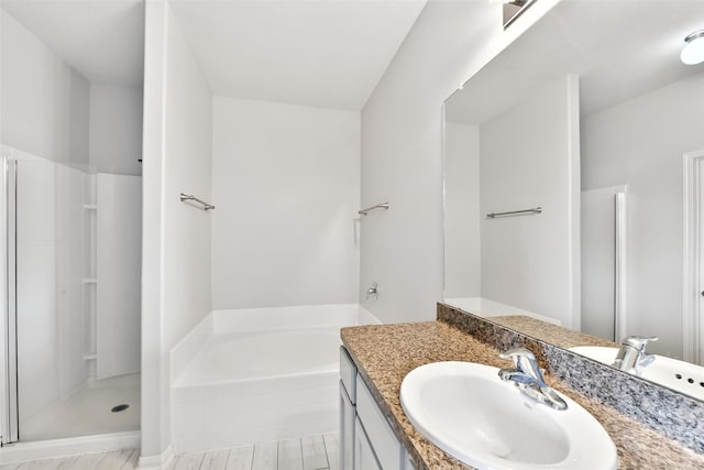 737 Grassy Knoll Ln, La Marque, TX 77568 - bathroom featuring vanity, a shower stall, and a bath