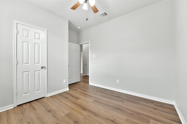737 Grassy Knoll Ln, La Marque, TX 77568 - unfurnished bedroom featuring light wood-style flooring and a ceiling fan