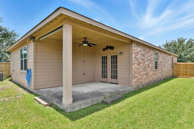 737 Grassy Knoll Ln, La Marque, TX 77568 - rear view of property with ceiling fan, a patio area, brick siding, and french doors