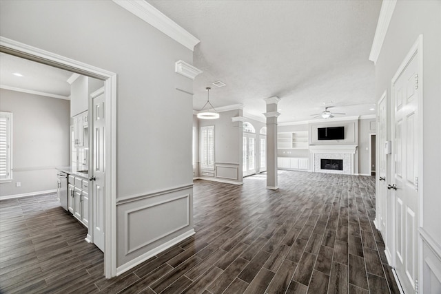 15814 Hillside Falls Trl, Houston, TX 77062 - hallway with crown molding, dark wood-style flooring, and decorative columns