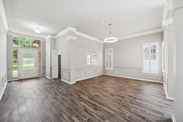 15814 Hillside Falls Trl, Houston, TX 77062 - unfurnished living room featuring a decorative wall, ornamental molding, dark wood-type flooring, and a wainscoted wall