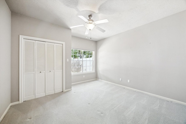 15814 Hillside Falls Trl, Houston, TX 77062 - unfurnished bedroom with carpet flooring, a textured ceiling, a closet, and ceiling fan
