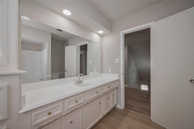 12611 Campsite Trl, Cypress, TX 77429 - bathroom featuring vanity, wood finished floors, and recessed lighting