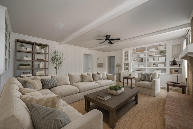 12611 Campsite Trl, Cypress, TX 77429 - living area featuring ceiling fan and beamed ceiling