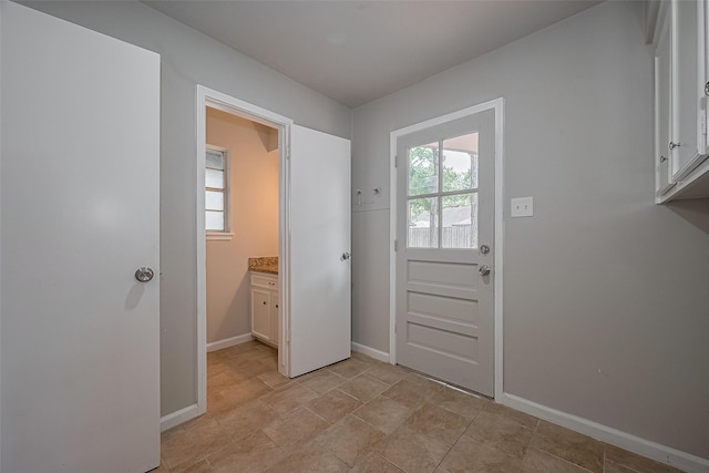 12611 Campsite Trl, Cypress, TX 77429 - doorway featuring baseboards