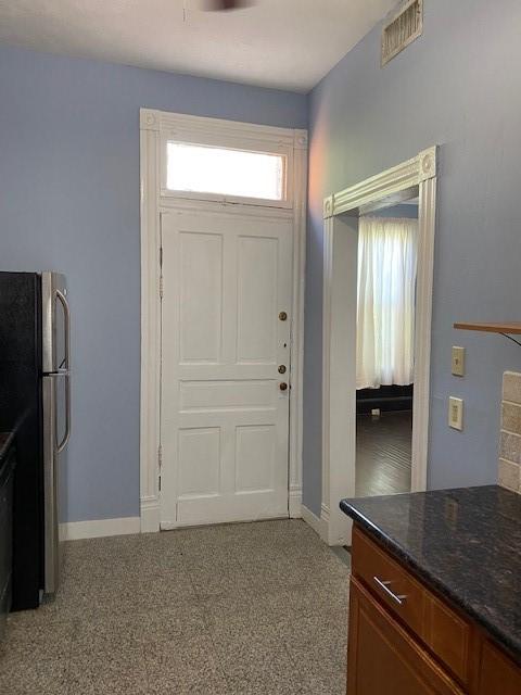 915 11th St, Galveston, TX 77550 - foyer entrance featuring baseboards
