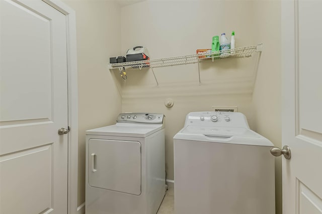 11410 Sandstone Canyon Dr, Humble, TX 77396 - laundry area with washer and clothes dryer