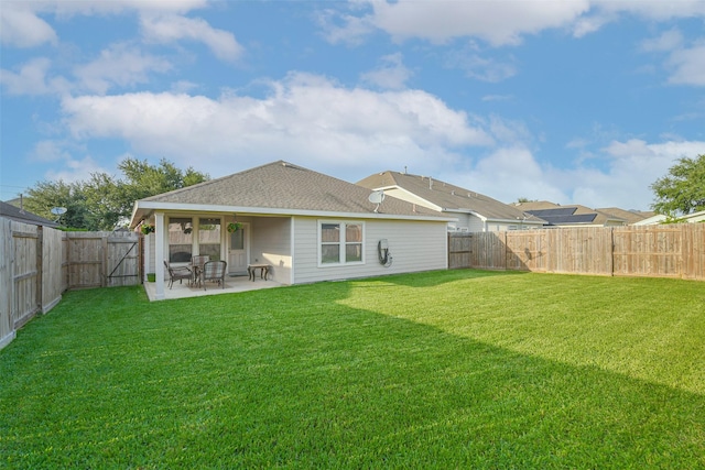 11410 Sandstone Canyon Dr, Humble, TX 77396 - rear view of house featuring a fenced backyard, a patio area, a gate, and roof with shingles