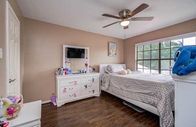 7826 Granite Ridge Ln, Houston, TX 77095 - bedroom featuring dark wood finished floors and a ceiling fan