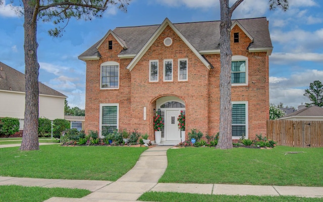 7826 Granite Ridge Ln, Houston, TX 77095 - view of front of property with brick siding and roof with shingles