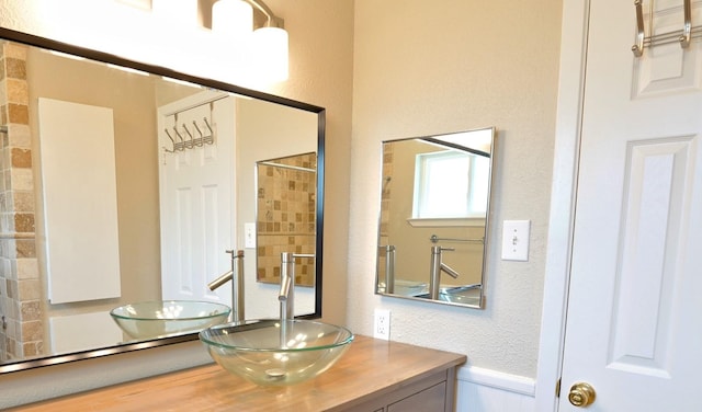 7354 Stone Pine Ln, Houston, TX 77041 - full bath with vanity, a textured wall, and a shower
