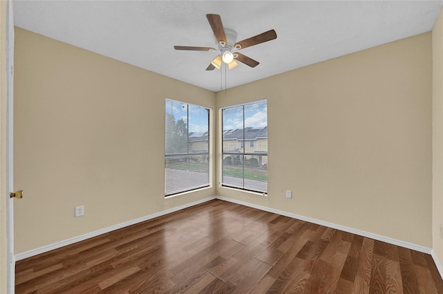 8405 Wilcrest Dr Unit 2800, Houston, TX 77072 - unfurnished room with dark wood finished floors and a ceiling fan