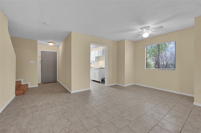 8405 Wilcrest Dr Unit 2800, Houston, TX 77072 - spare room featuring ceiling fan and a smoke detector