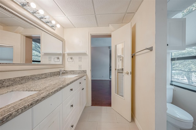 5150 Hidalgo St Unit 204, Houston, TX 77056 - full bathroom with a paneled ceiling, double vanity, and tile patterned floors