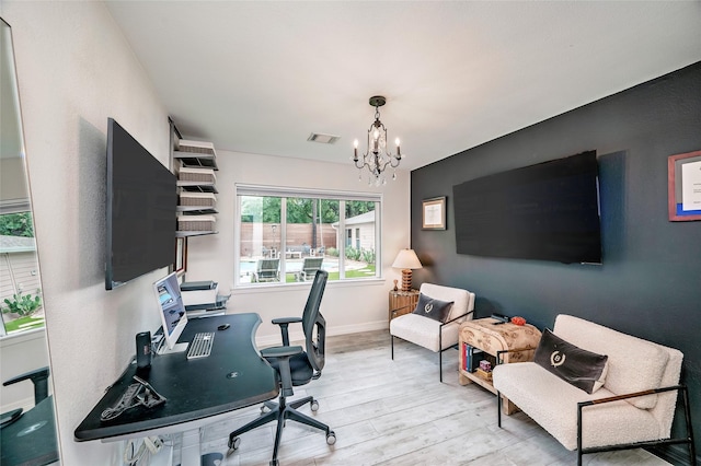 4019 Grennoch Ln, Houston, TX 77025 - home office with a chandelier and wood finished floors