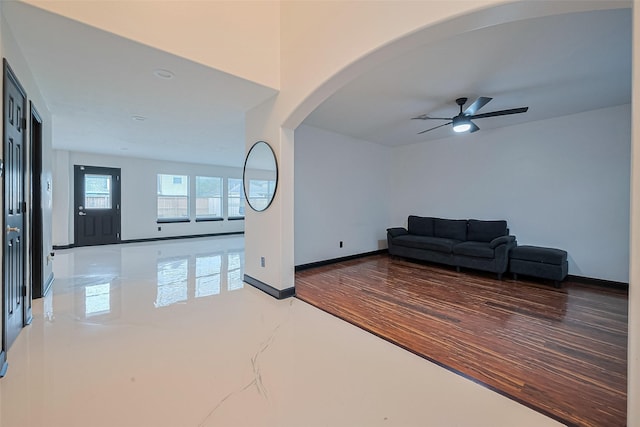 13703 Broad Oaks Ln, Rosharon, TX 77583 - living area featuring arched walkways and a ceiling fan