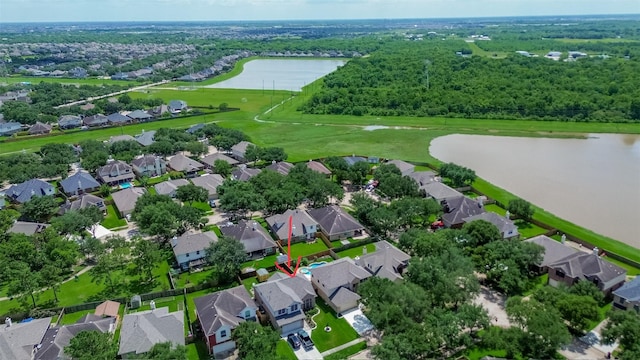13703 Broad Oaks Ln, Rosharon, TX 77583 - aerial overview of property's location with a nearby body of water and nearby suburban area