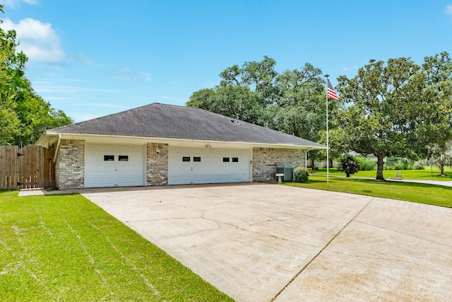 105 Pleasant Valley Dr, West Columbia, TX 77486 - view of property exterior with brick siding and concrete driveway