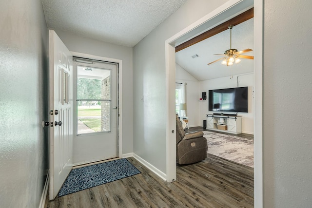 105 Pleasant Valley Dr, West Columbia, TX 77486 - foyer with wood finished floors, vaulted ceiling, ceiling fan, and a textured ceiling