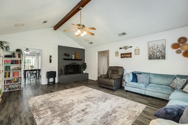 105 Pleasant Valley Dr, West Columbia, TX 77486 - living area with a ceiling fan, dark wood finished floors, and a brick fireplace