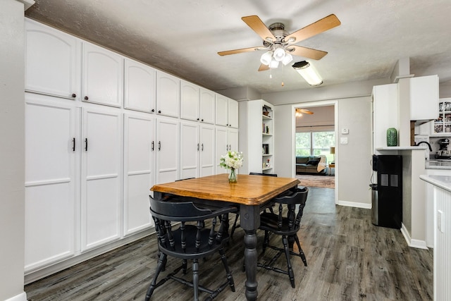 105 Pleasant Valley Dr, West Columbia, TX 77486 - dining room with ceiling fan and dark wood-style floors