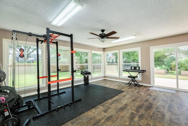 105 Pleasant Valley Dr, West Columbia, TX 77486 - exercise room featuring ceiling fan, a textured ceiling, and wood finished floors