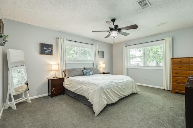 105 Pleasant Valley Dr, West Columbia, TX 77486 - carpeted bedroom with a textured ceiling and ceiling fan